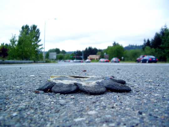 glove in the middle of the road